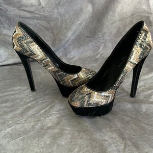 Elegant Black and Gold High Heels